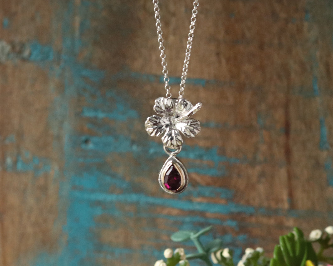 Garnet Hibiscus Pendant in gold and Sterling Silver